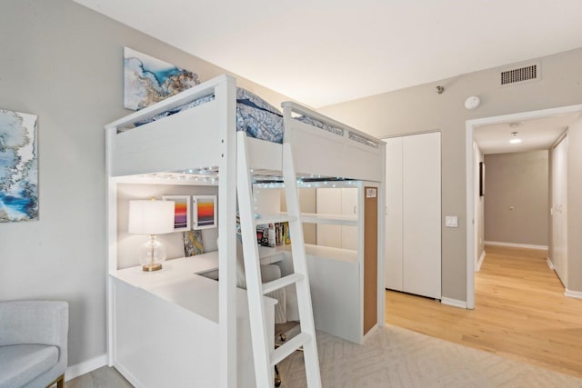 bedroom featuring hardwood / wood-style flooring