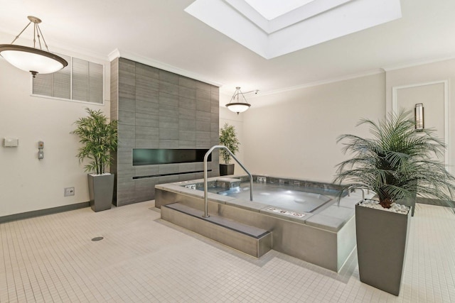 bathroom featuring tile patterned flooring, crown molding, and a skylight