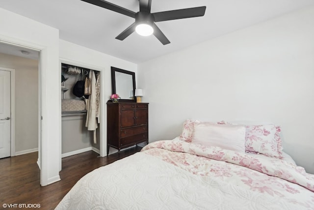 bedroom featuring dark hardwood / wood-style flooring, ceiling fan, and a closet