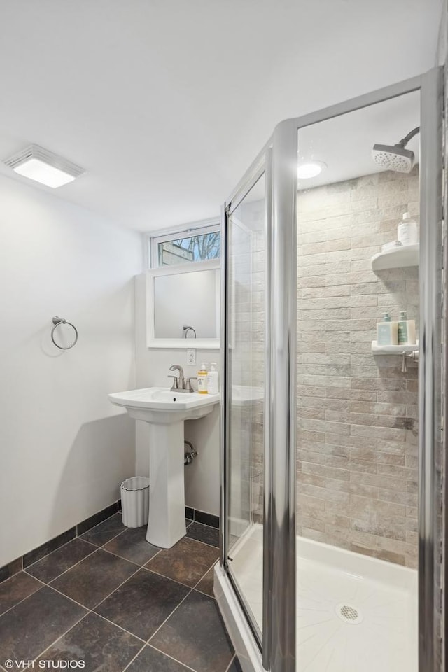 bathroom with an enclosed shower