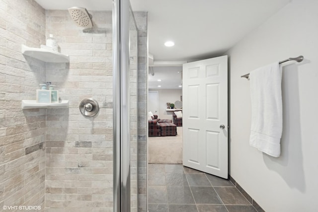 bathroom with a shower with shower door