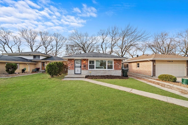 view of front of home with a garage and a front yard