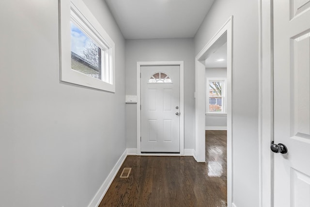 doorway featuring dark hardwood / wood-style flooring