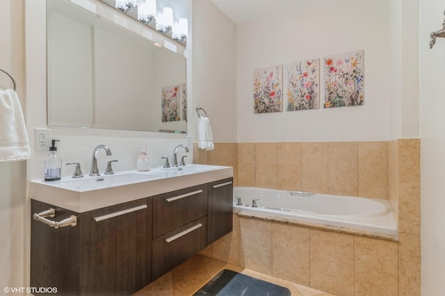 bathroom with vanity and tiled bath