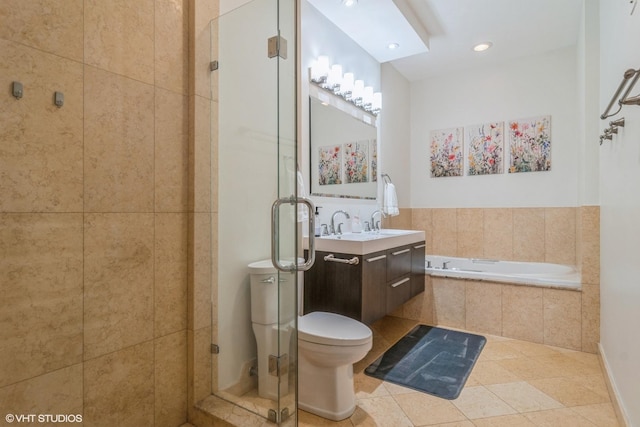 full bathroom with tile patterned floors, vanity, toilet, and independent shower and bath