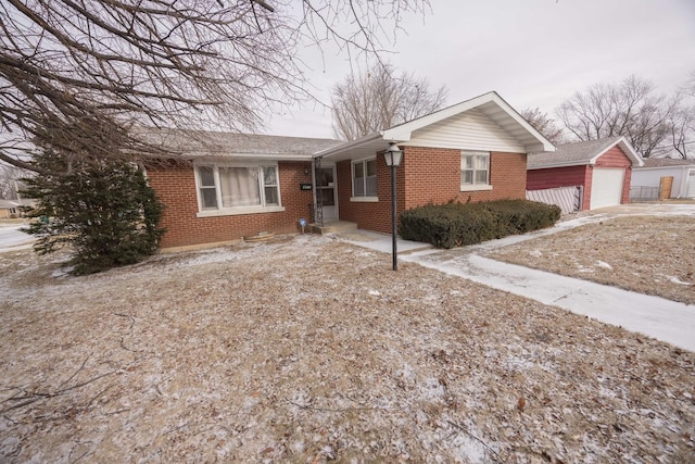 single story home with a garage