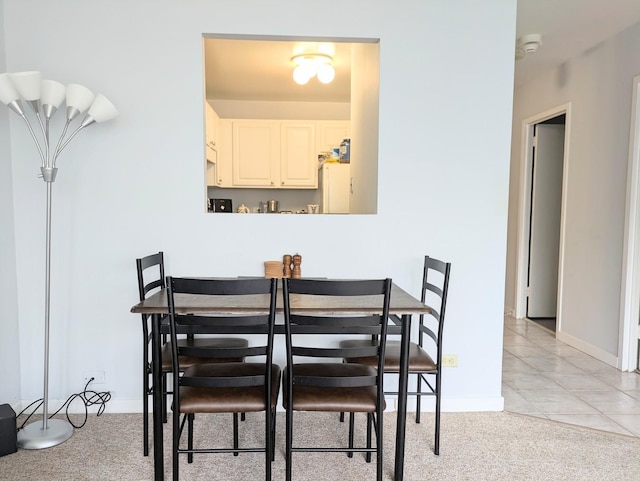 view of tiled dining space