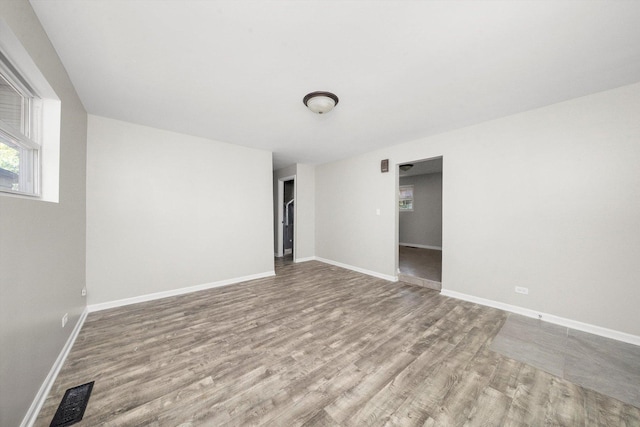 unfurnished room featuring light wood-type flooring