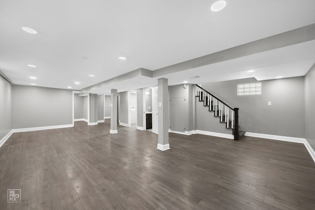 basement with dark wood-type flooring