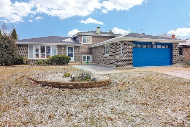 split level home with a garage