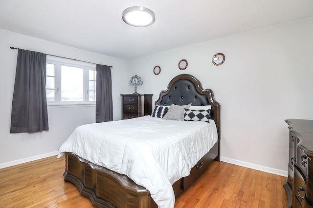 bedroom featuring hardwood / wood-style flooring