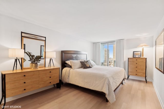 bedroom featuring light hardwood / wood-style floors