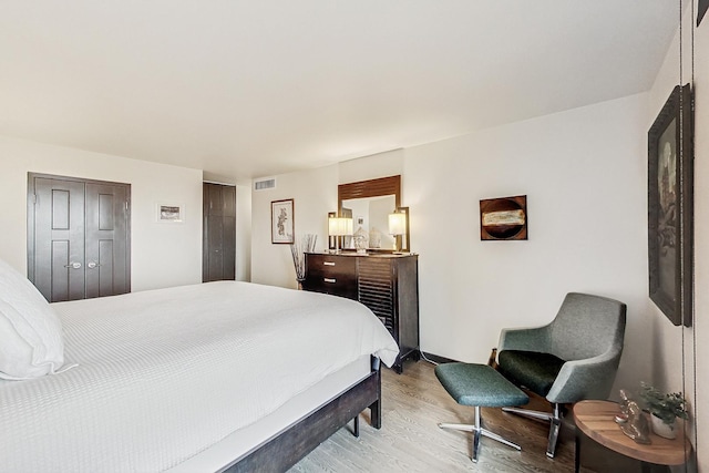 bedroom featuring hardwood / wood-style floors