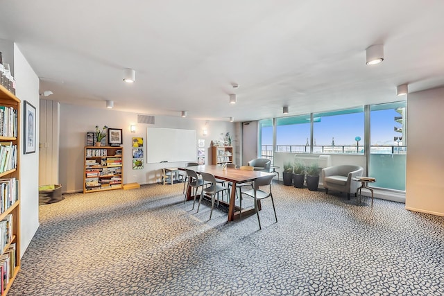 view of carpeted dining area