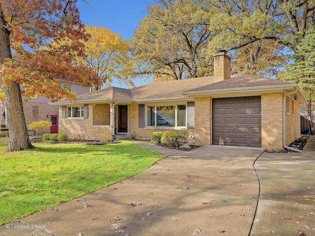 ranch-style home featuring a garage and a front lawn