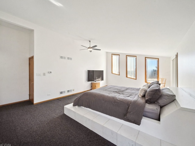 bedroom with visible vents, baseboards, lofted ceiling, ceiling fan, and carpet flooring