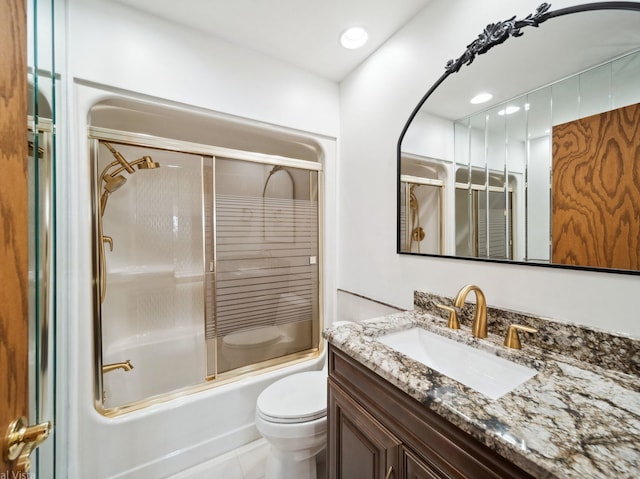 bathroom featuring toilet, tile patterned floors, combined bath / shower with glass door, vanity, and recessed lighting