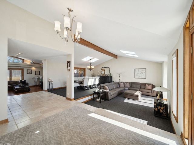 carpeted living area featuring an inviting chandelier, lofted ceiling with skylight, and tile patterned floors