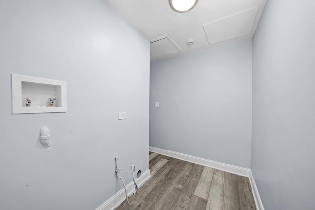 laundry room with dark hardwood / wood-style flooring and hookup for a washing machine