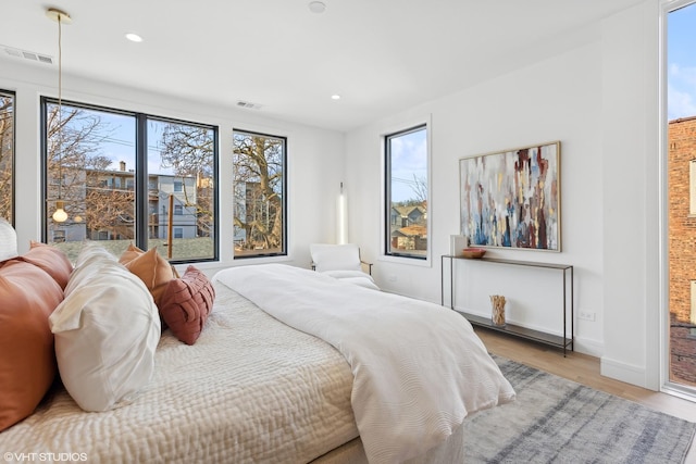 bedroom featuring light hardwood / wood-style floors