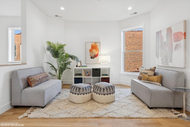 sitting room featuring hardwood / wood-style flooring