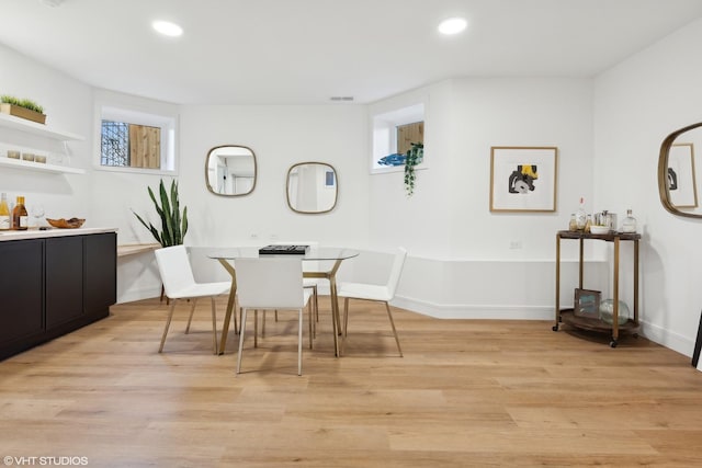 dining room featuring light hardwood / wood-style flooring