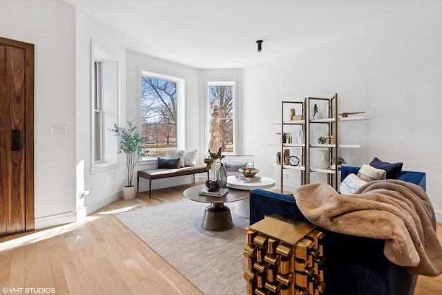 sitting room with light hardwood / wood-style floors