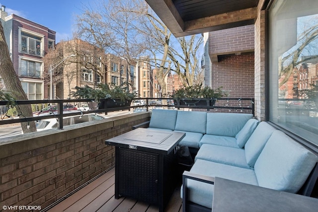 wooden deck featuring an outdoor living space