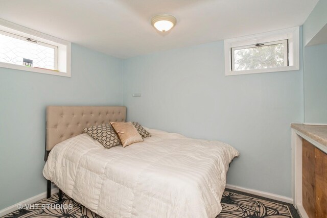 bedroom featuring multiple windows