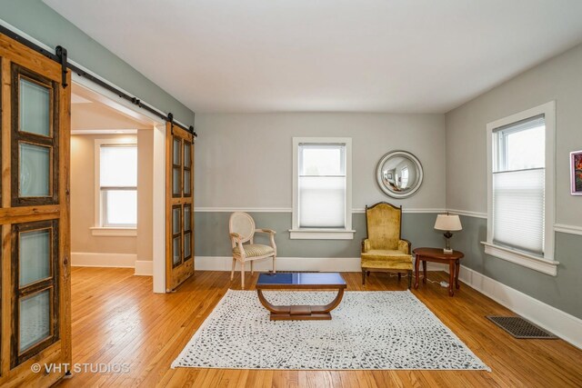 living room featuring a tray ceiling