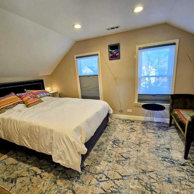 bedroom featuring vaulted ceiling