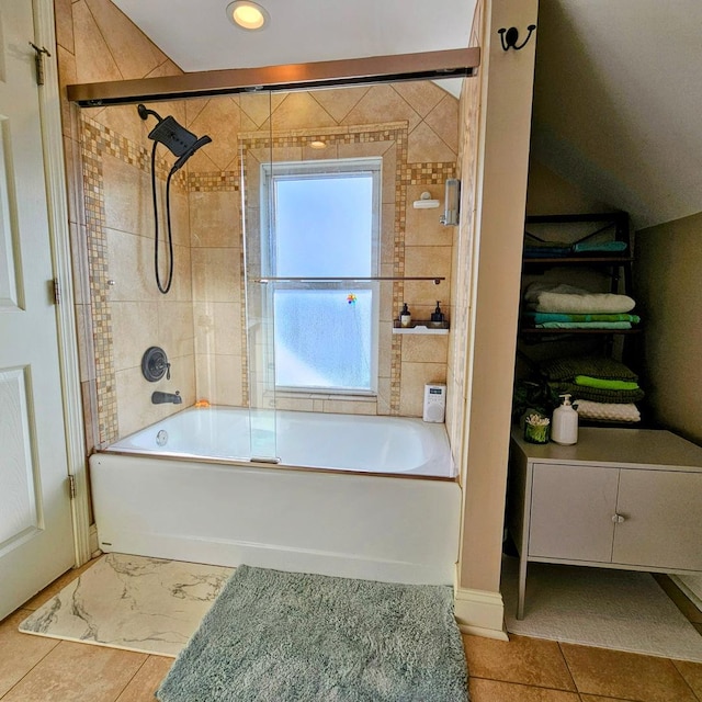 bathroom featuring enclosed tub / shower combo and tile patterned flooring