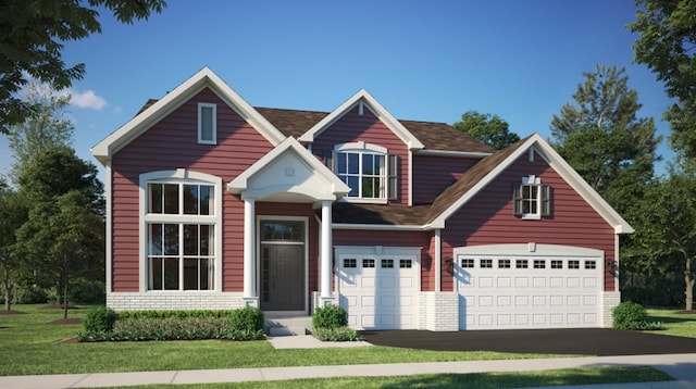 view of front facade featuring a garage and a front yard