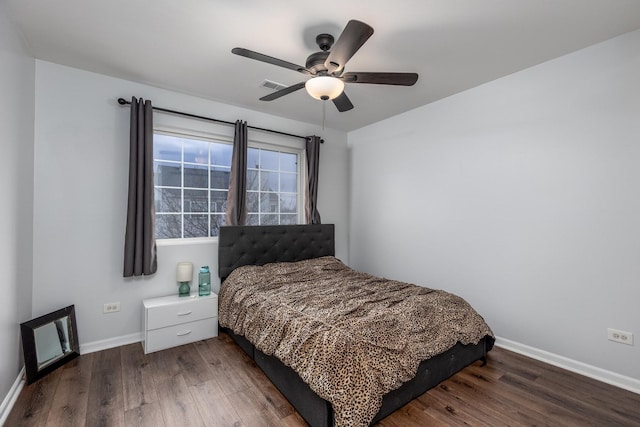 bedroom featuring dark hardwood / wood-style floors and ceiling fan