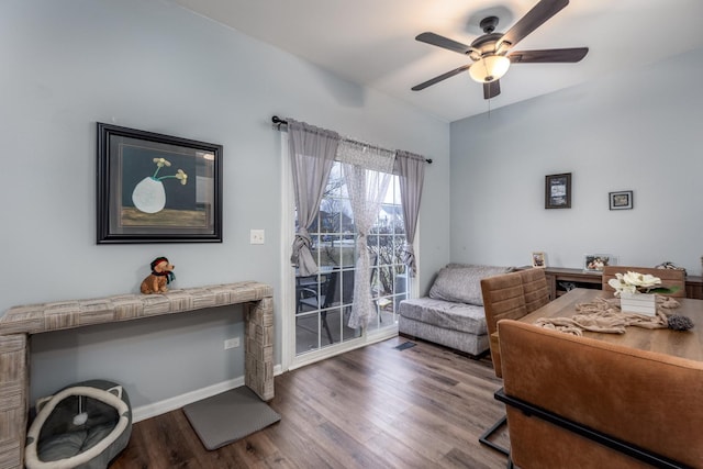 living area with ceiling fan and wood-type flooring