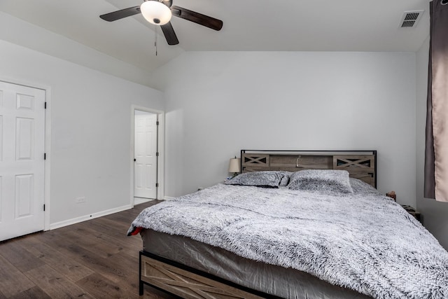 bedroom featuring ceiling fan, vaulted ceiling, and dark wood-type flooring