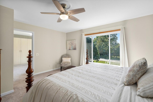 bedroom featuring ceiling fan and light colored carpet