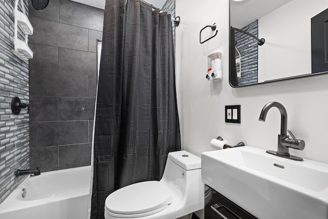 full bathroom featuring shower / tub combo, sink, and toilet