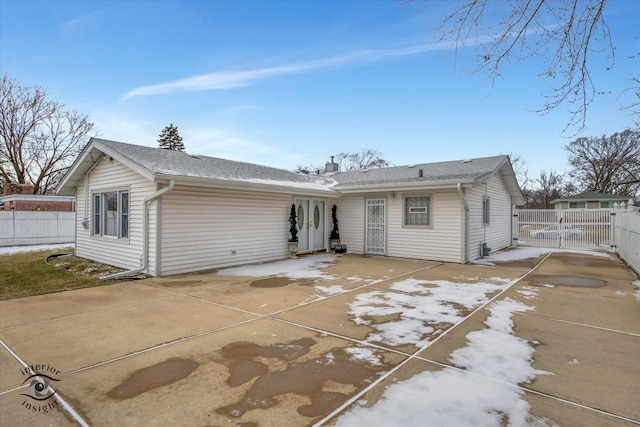 rear view of house with a patio