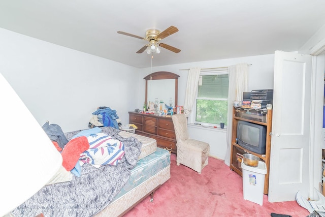 bedroom with ceiling fan and carpet