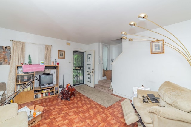 living room with parquet floors