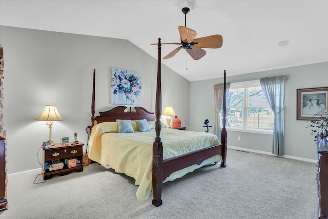 carpeted bedroom featuring lofted ceiling and ceiling fan