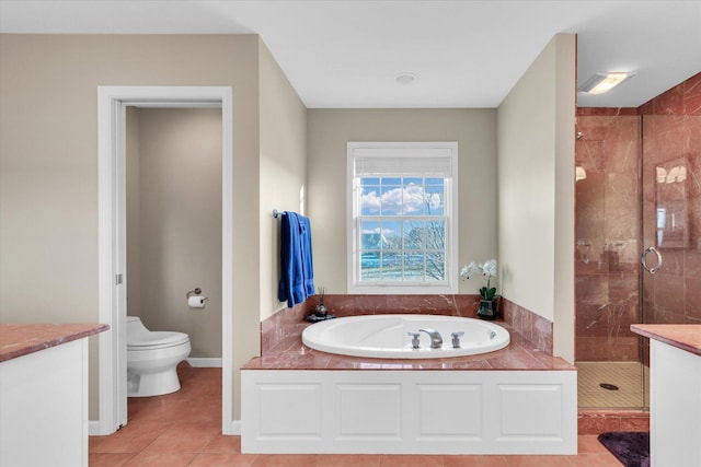 full bathroom with tile patterned flooring, vanity, toilet, and separate shower and tub