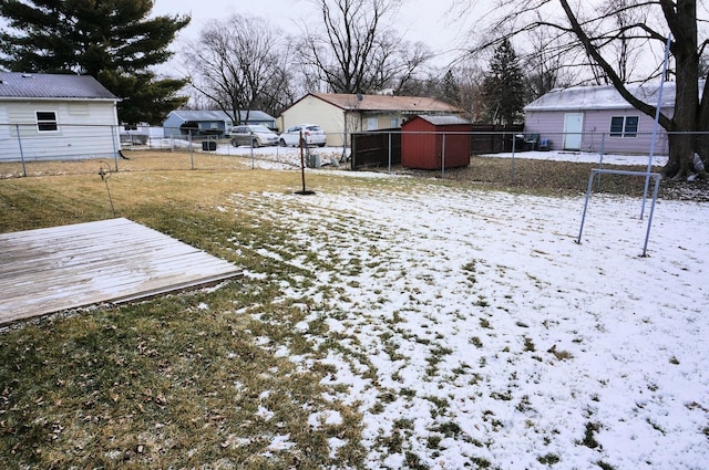 view of yard layered in snow