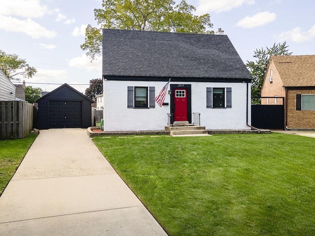 view of front of house featuring a garage, an outdoor structure, and a front lawn