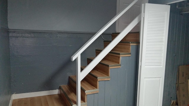 stairway featuring hardwood / wood-style flooring