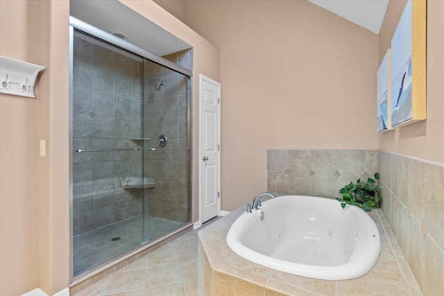 bathroom featuring separate shower and tub and tile patterned floors