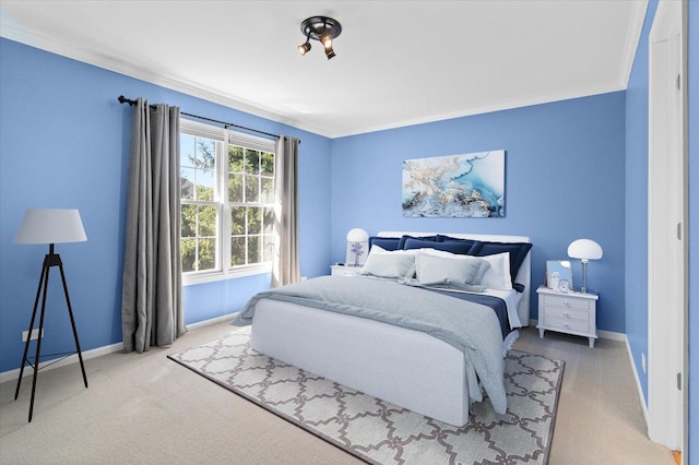 carpeted bedroom featuring ornamental molding