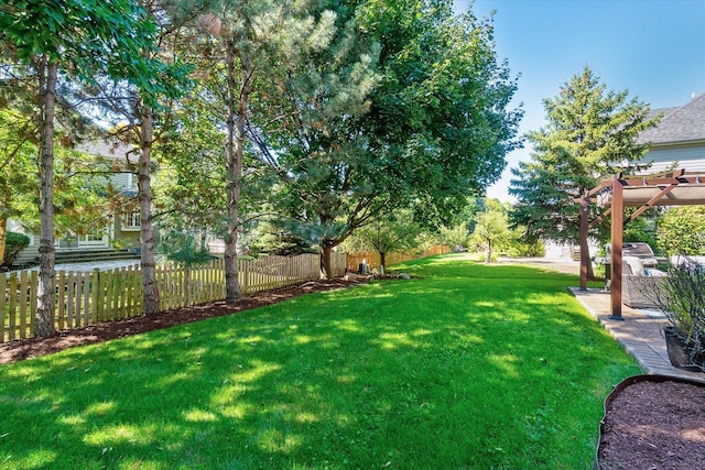 view of yard with a pergola