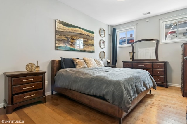 bedroom featuring light wood-type flooring